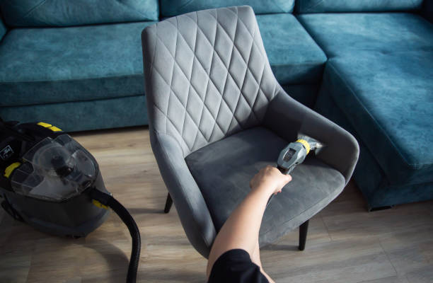 Using professional Karcher equipment for upholstery deep cleaning.
